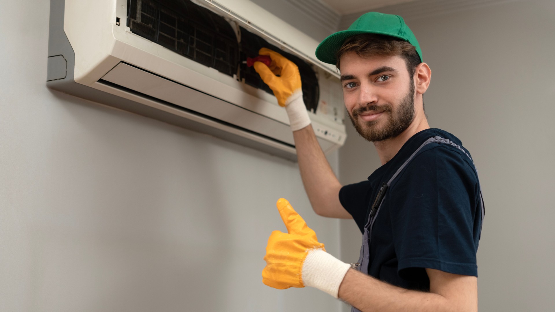 air conditioner repairman working